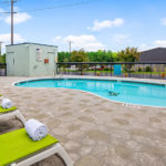 outdoor pool and lounge chairs